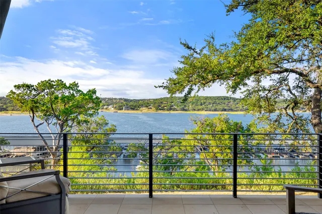 a view of a lake with a building in the background