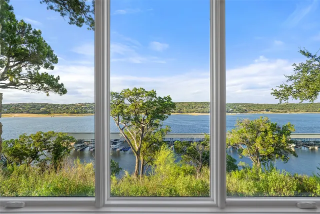 a bathroom with a sink double vanity and a mirror