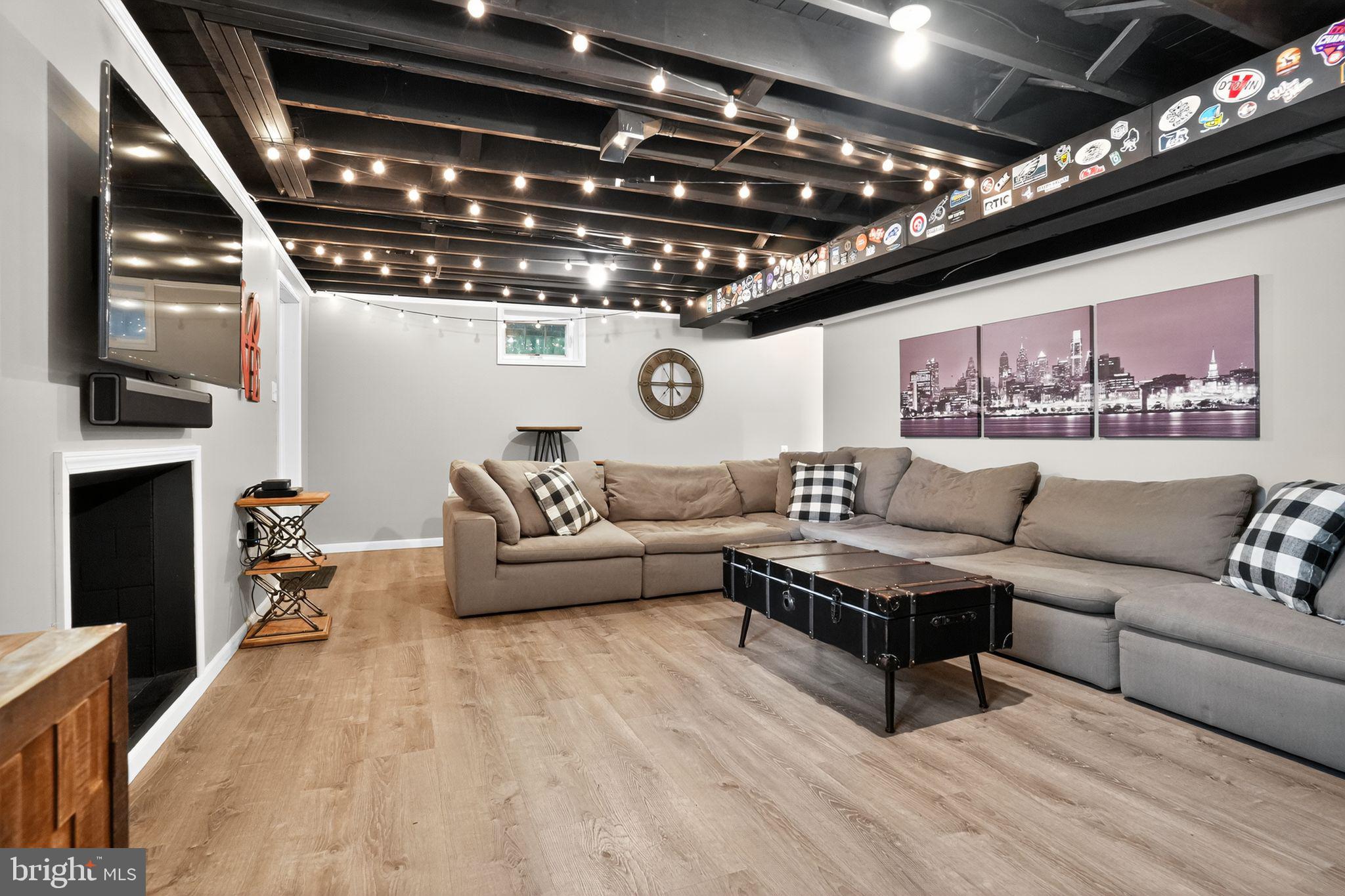 17 Fox Chase Road Malvern, PA 19355 - Photo 45 of 65 Finished Basement Room with Fireplace