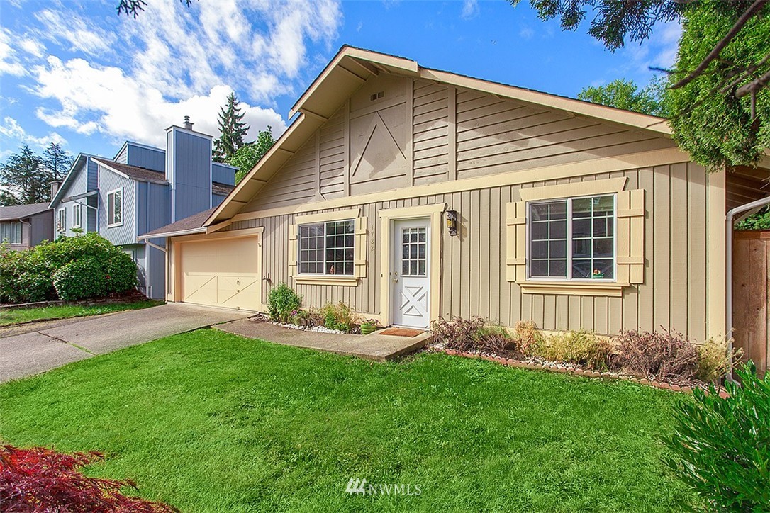 1722 225th Street Southeast Bothell, WA 98021 - Photo 2 of 19 a front view of a house with a yard and porch