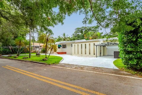 a view of a park with a slide