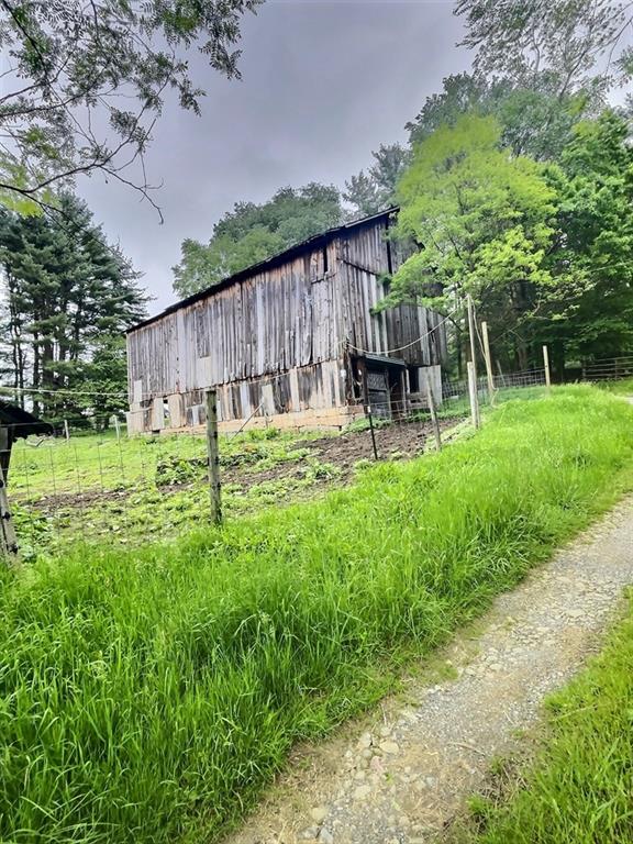 1029 Greenwood Road Marienville, PA 16239 - Photo 2 of 20 a garden view with a seating space