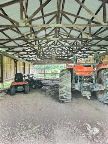 a view of a garage with a car and car