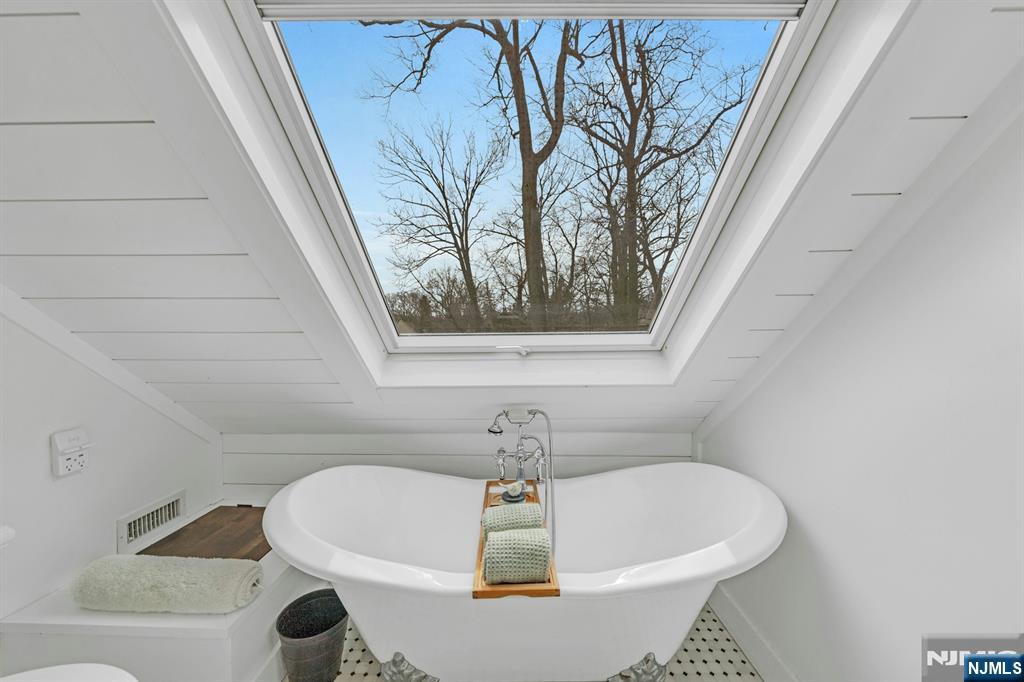 8 Glenwood Road Denville, NJ 07834 - Photo 18 of 37 a bathroom with a bathtub