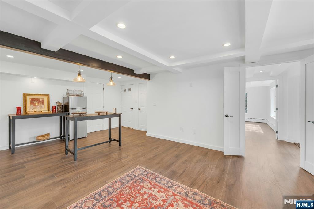 8 Glenwood Road Denville, NJ 07834 - Photo 22 of 37 a view of a room with wooden floor and furniture