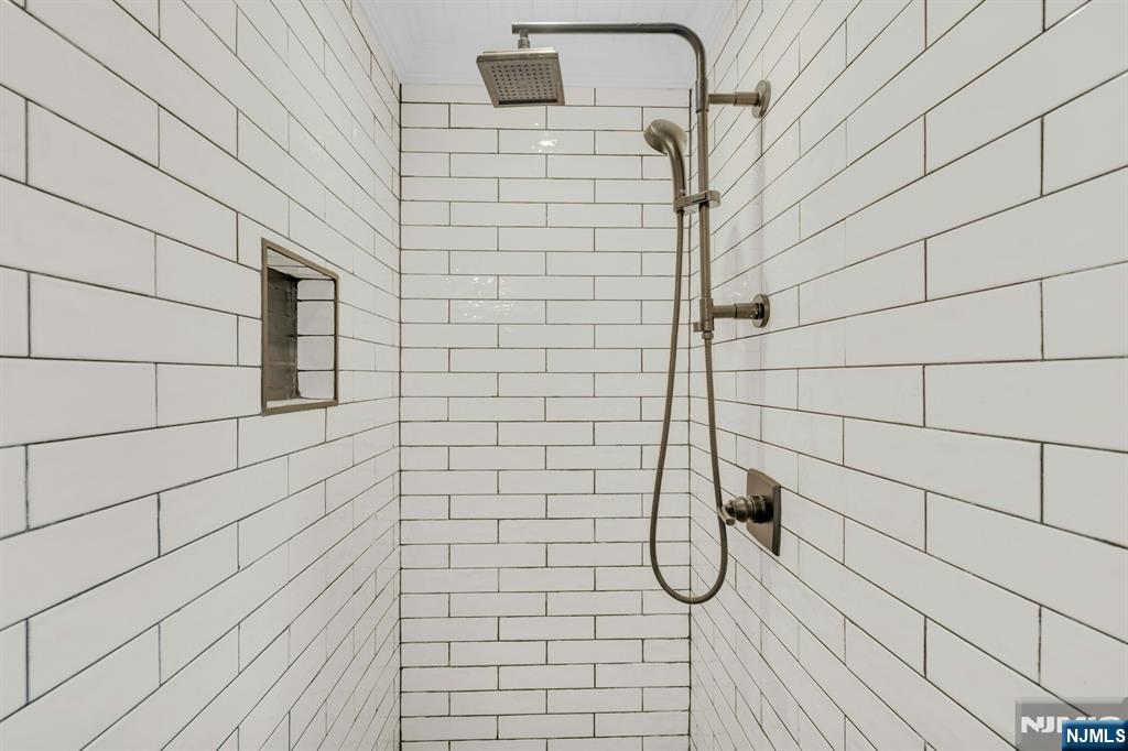 8 Glenwood Road Denville, NJ 07834 - Photo 25 of 37 a bathroom with a shower