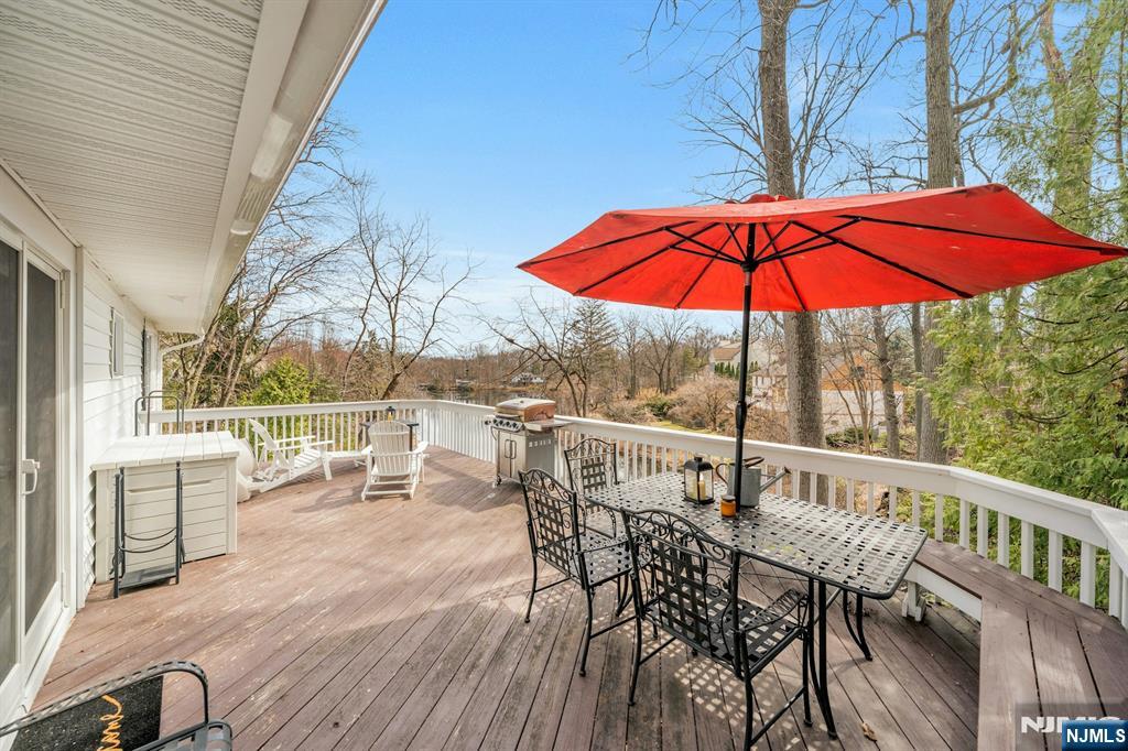 8 Glenwood Road Denville, NJ 07834 - Photo 28 of 37 a view of a chair and table on the deck