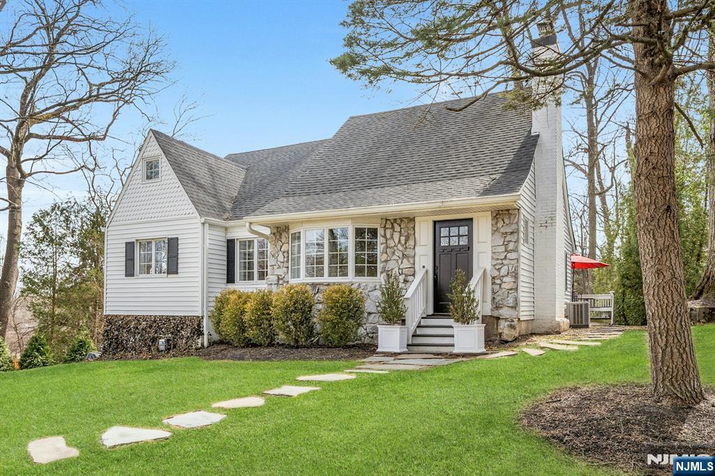 8 Glenwood Road Denville, NJ 07834 - Photo 3 of 37 a view of a house with backyard and garden