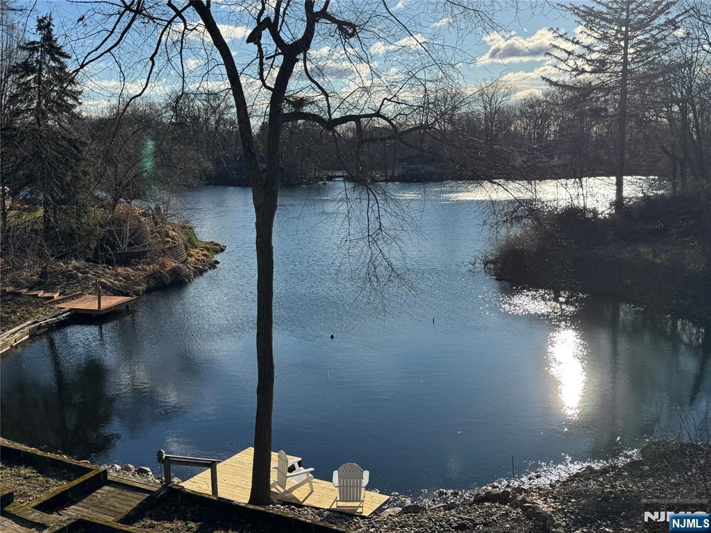 8 Glenwood Road Denville, NJ 07834 - Photo 8 of 37 a view of a lake from a balcony