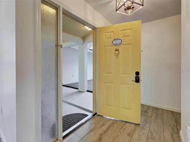 a kitchen with stainless steel appliances granite countertop a refrigerator sink and cabinets