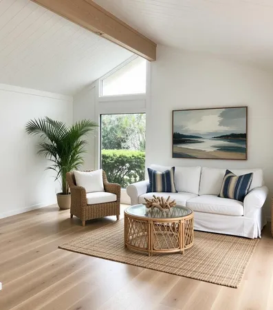 a living room with furniture potted plant and a large window