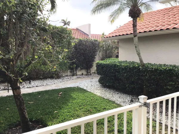 a view of a backyard with a garden