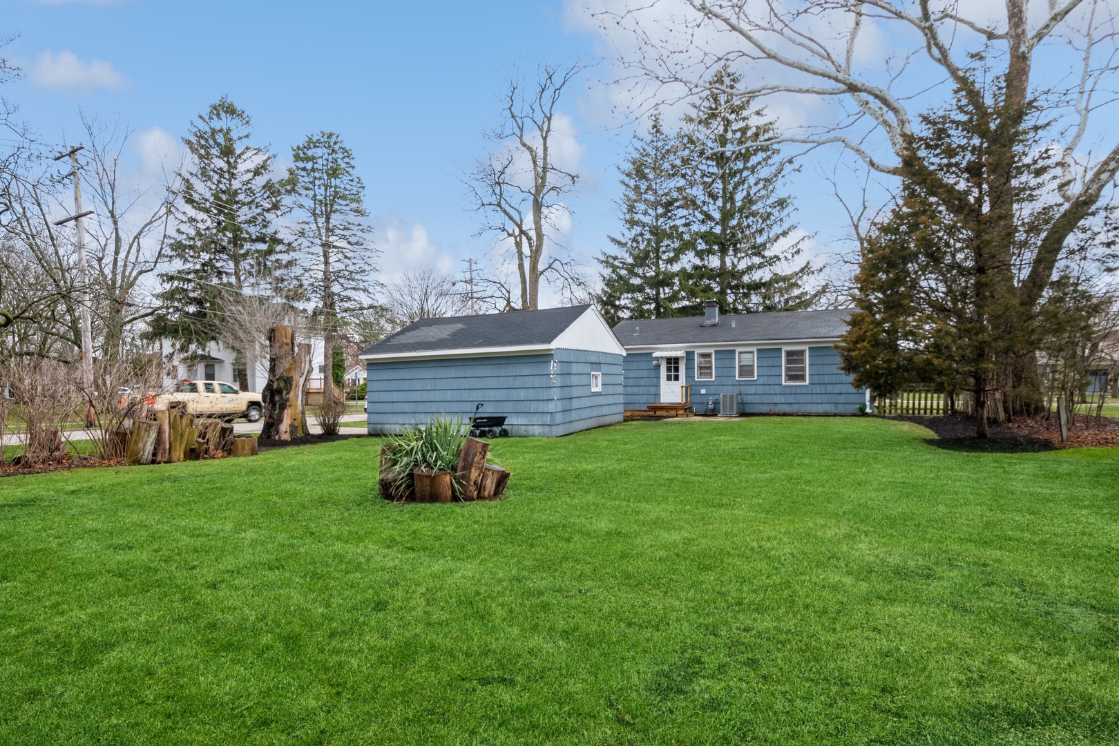 735 Chestnut Street Deerfield, IL 60015 - Photo 18 of 18 a view of a house with backyard and a tree