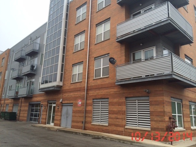 3522 South State Street, Unit 301 Chicago, IL 60609 - Photo 2 of 12 a front view of a building