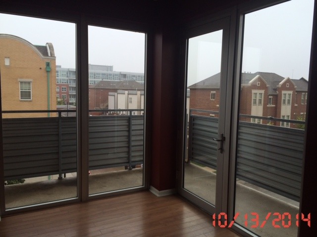 3522 South State Street, Unit 301 Chicago, IL 60609 - Photo 12 of 12 a view of a balcony from an empty room