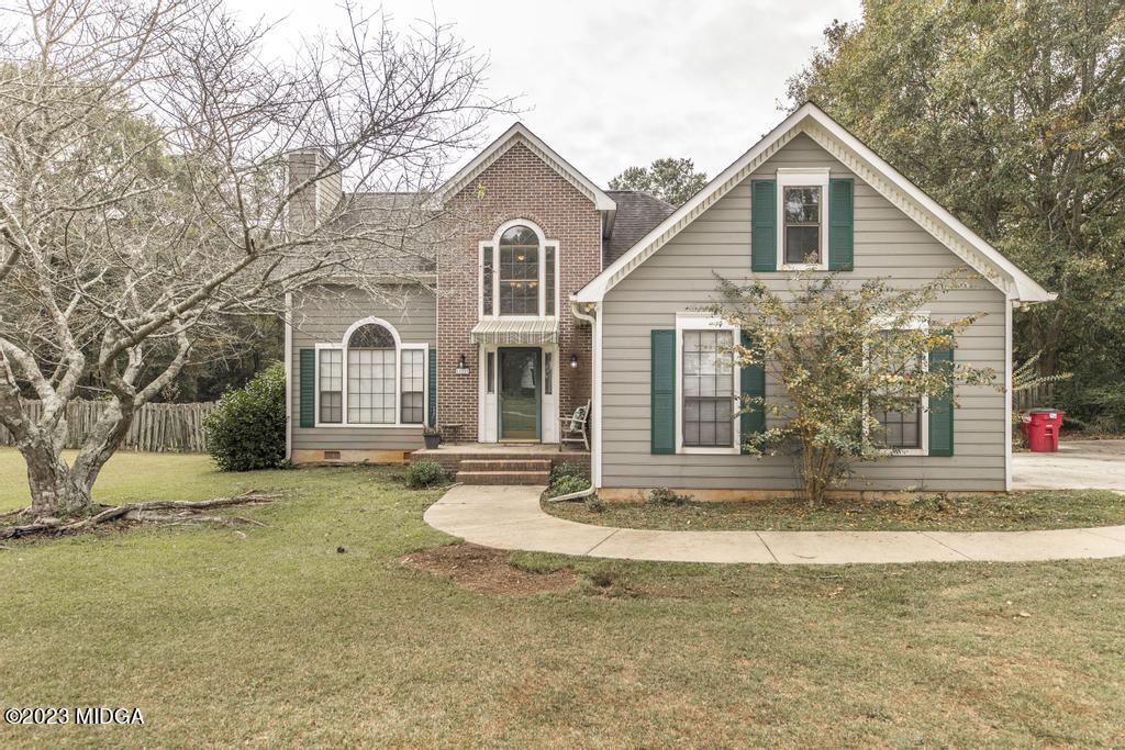 112 Ridge Circle Macon, GA 31216 - Photo 1 of 45 a front view of a house with a yard