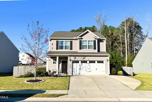 a front view of a house with swimming pool