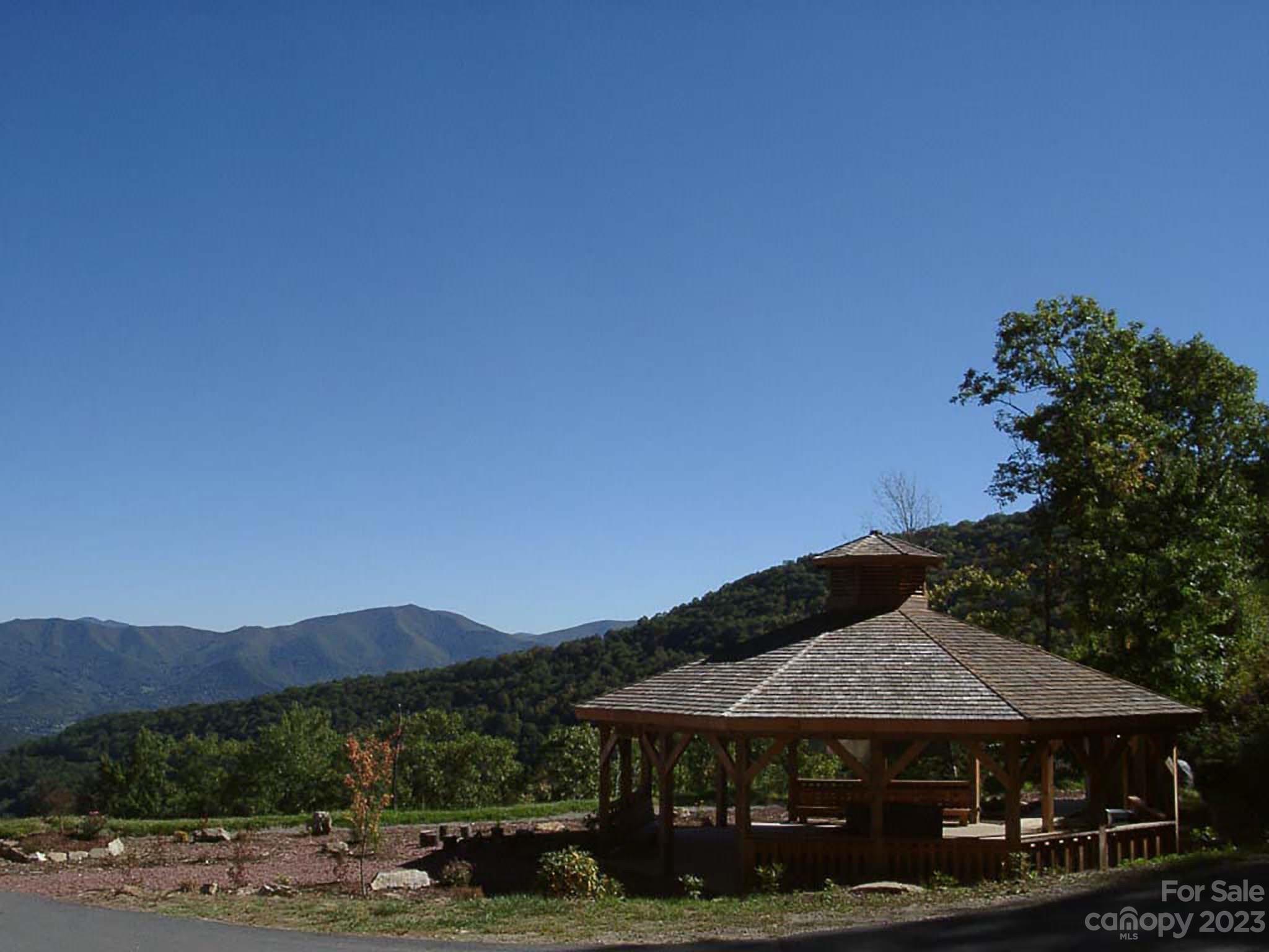 0 Chestnut Flats Road, Unit 13 Waynesville, NC 28786 - Photo 40 of 41 a front view of a house with a yard