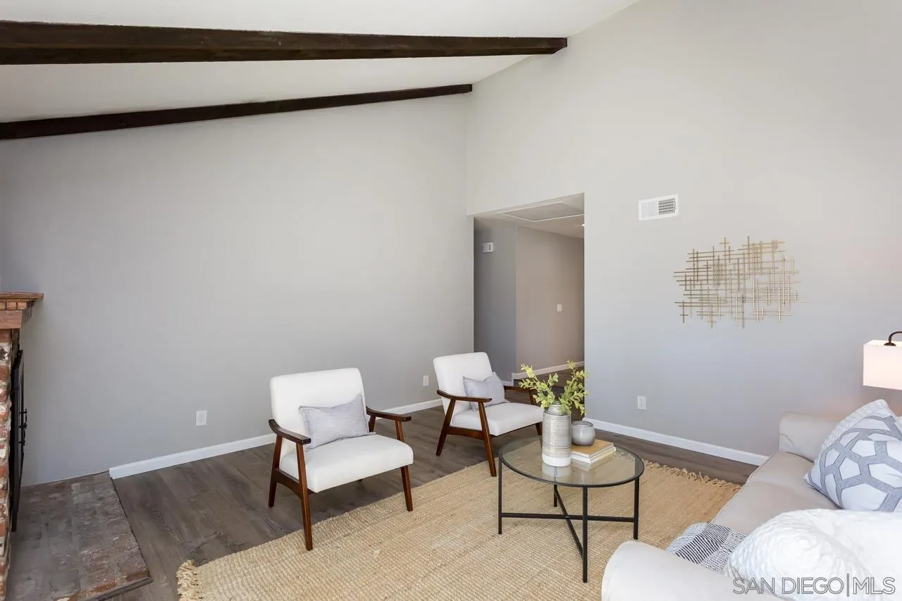 14427 Mirando Street Poway, CA 92064 - Photo 12 of 33 a living room with furniture and wooden floor