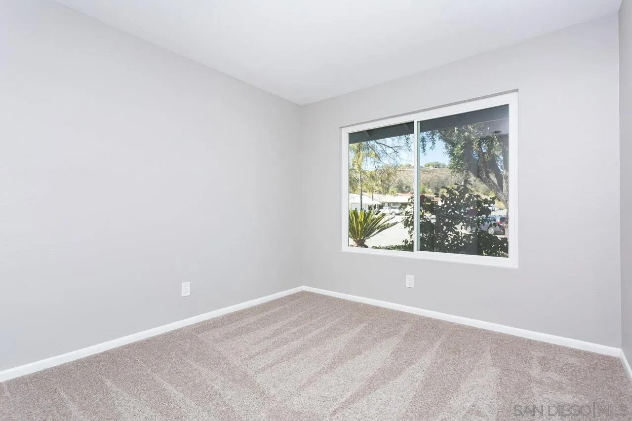 14427 Mirando Street Poway, CA 92064 - Photo 18 of 33 an empty room with a window