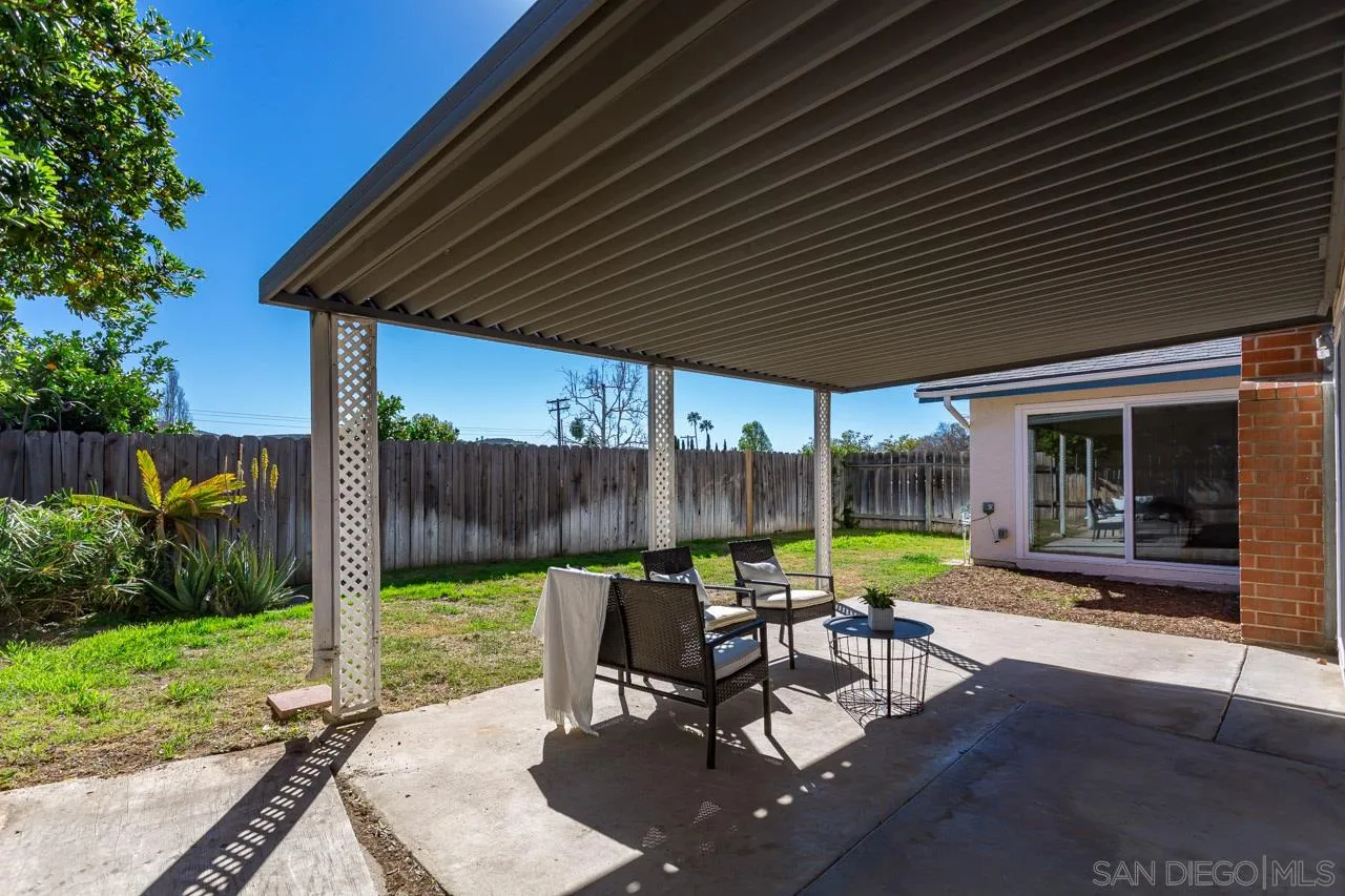 14427 Mirando Street Poway, CA 92064 - Photo 25 of 33 a view of a patio with chairs and table in patio