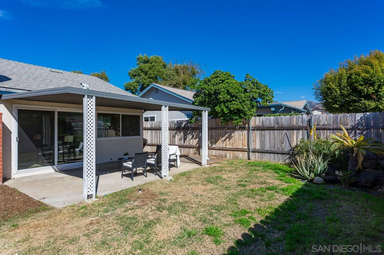 14427 Mirando Street Poway, CA 92064 - Photo 28 of 33 a view of a chair and table in backyard of the house