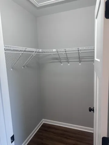 a view of a room with racks on the wall