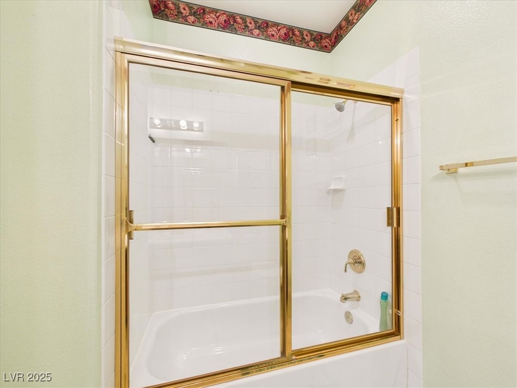 321 Whispering Tree Avenue Las Vegas, NV 89183 - Photo 36 of 95 Bathroom featuring enclosed tub / shower combo