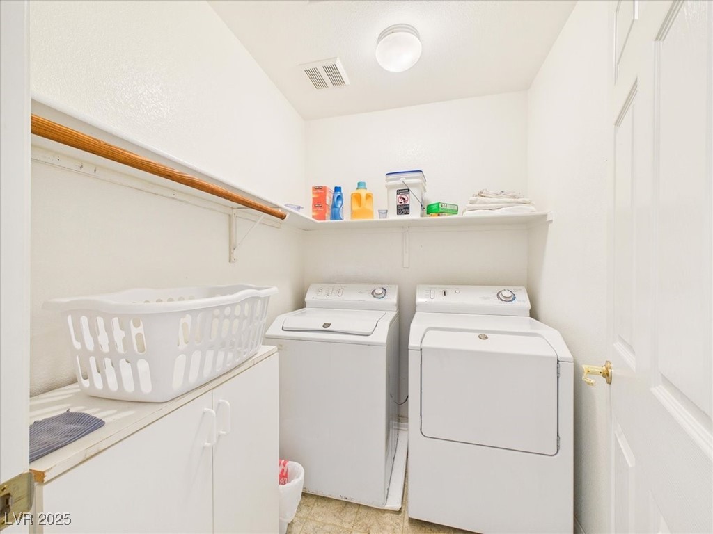 321 Whispering Tree Avenue Las Vegas, NV 89183 - Photo 63 of 95 Washroom featuring separate washer and dryer