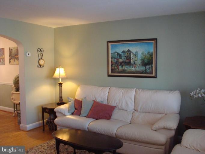1009 Downton Road Halethorpe, MD 21227 - Photo 3 of 30 a living room with furniture and a lamp