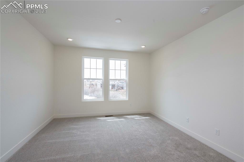 2042 Peachleaf Loop Castle Rock, CO 80108 - Photo 14 of 26 an empty room with a window