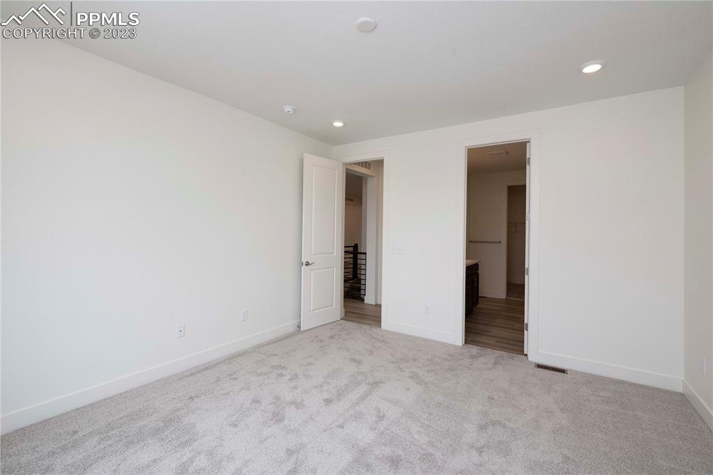 2042 Peachleaf Loop Castle Rock, CO 80108 - Photo 15 of 26 a view of an empty room