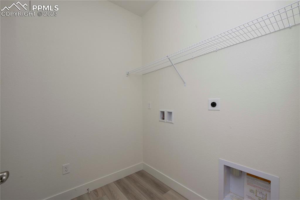 2042 Peachleaf Loop Castle Rock, CO 80108 - Photo 19 of 26 a view of a room with racks on the wall