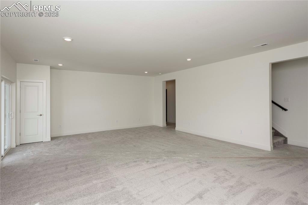2042 Peachleaf Loop Castle Rock, CO 80108 - Photo 21 of 26 a view of an empty room
