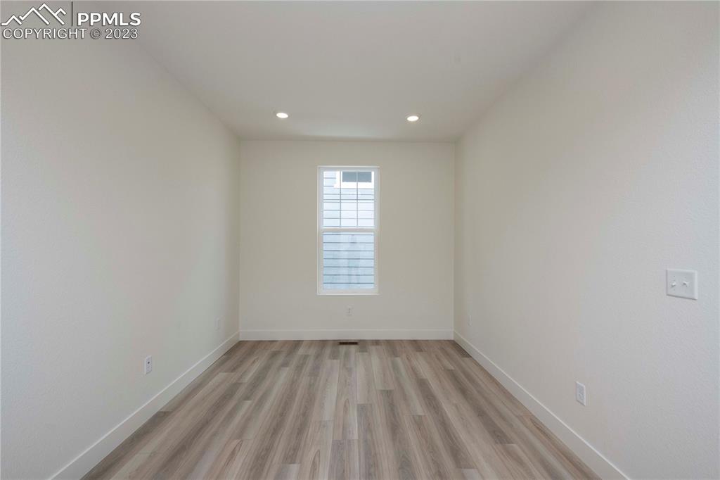 2042 Peachleaf Loop Castle Rock, CO 80108 - Photo 6 of 26 a view of an empty room and a window