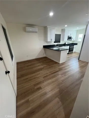 a bathroom with a shower and toilet