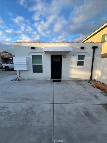 a utility room with washing machine
