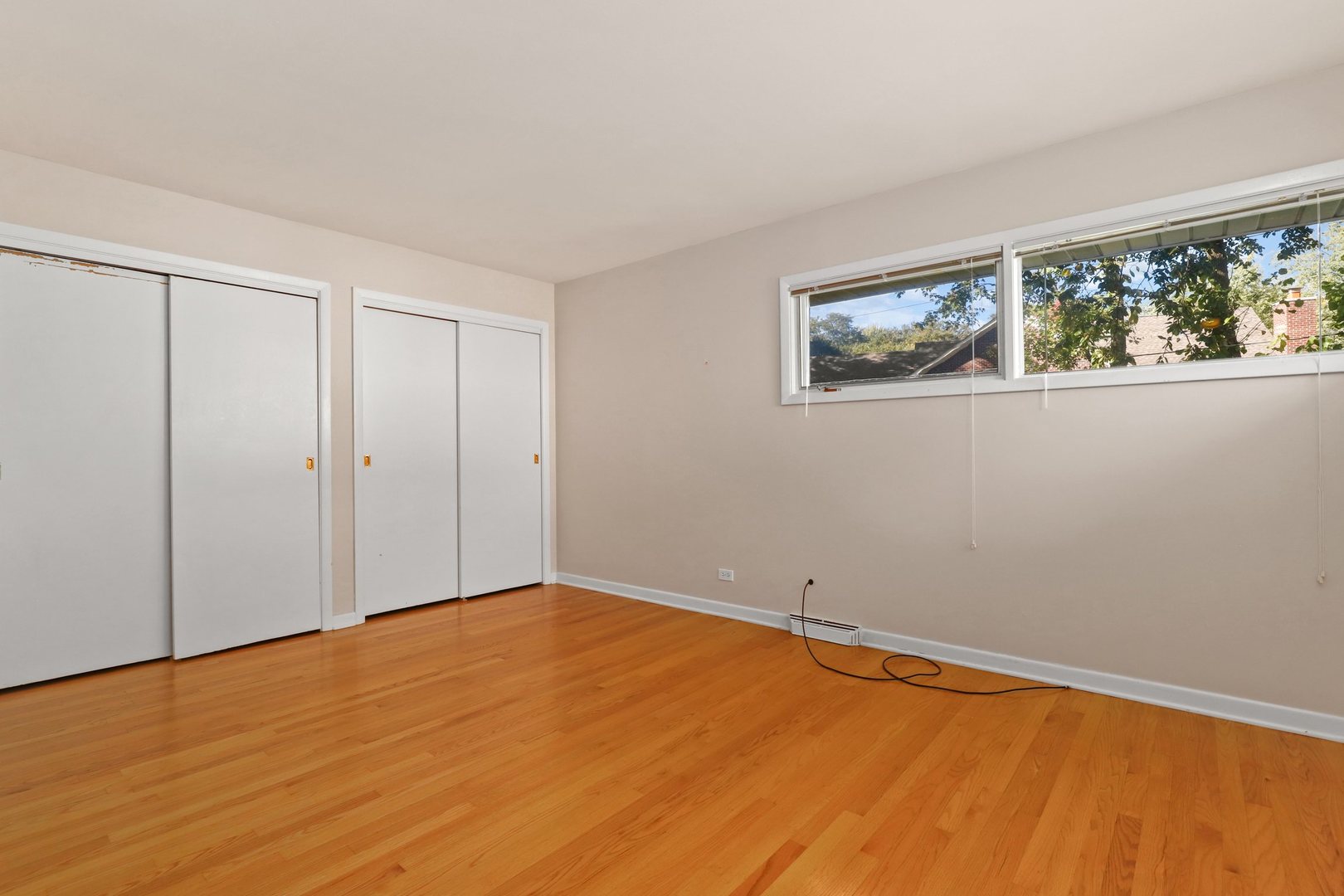 410 Ferndale Road Glenview, IL 60025 - Photo 14 of 34 a view of an empty room with wooden floor and window