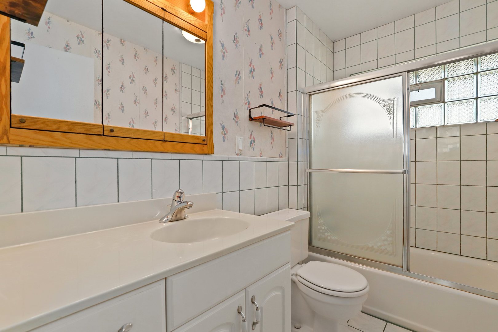 410 Ferndale Road Glenview, IL 60025 - Photo 16 of 34 a bathroom with a sink toilet and shower