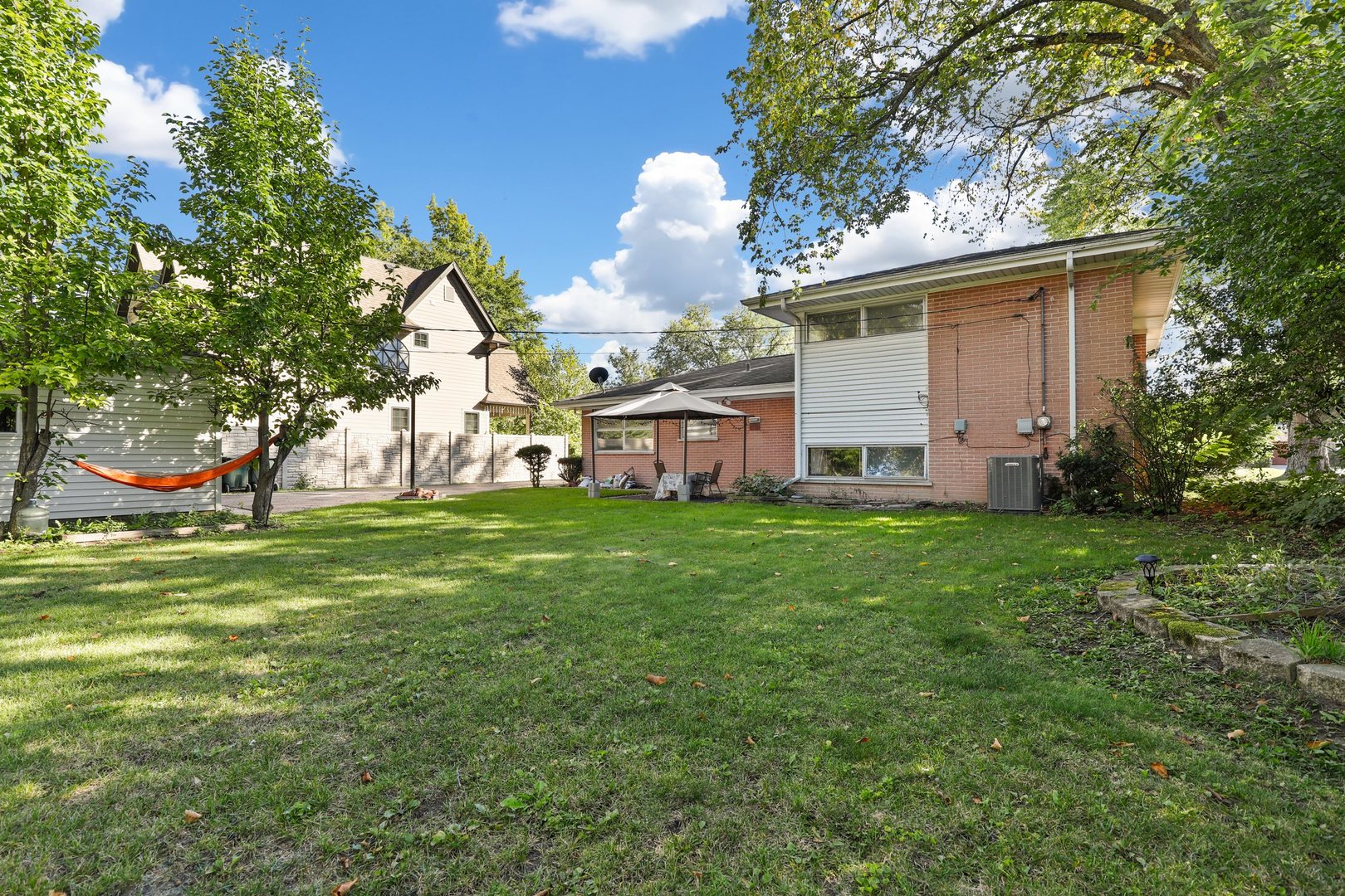410 Ferndale Road Glenview, IL 60025 - Photo 28 of 34 a view of a house with a backyard