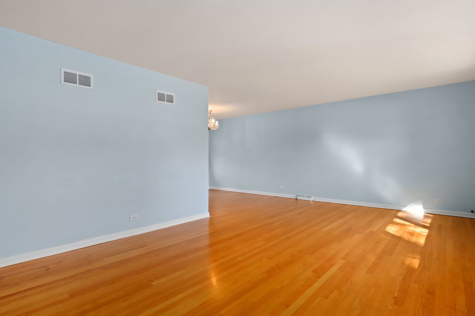 410 Ferndale Road Glenview, IL 60025 - Photo 5 of 34 a view of an empty room with wooden floor