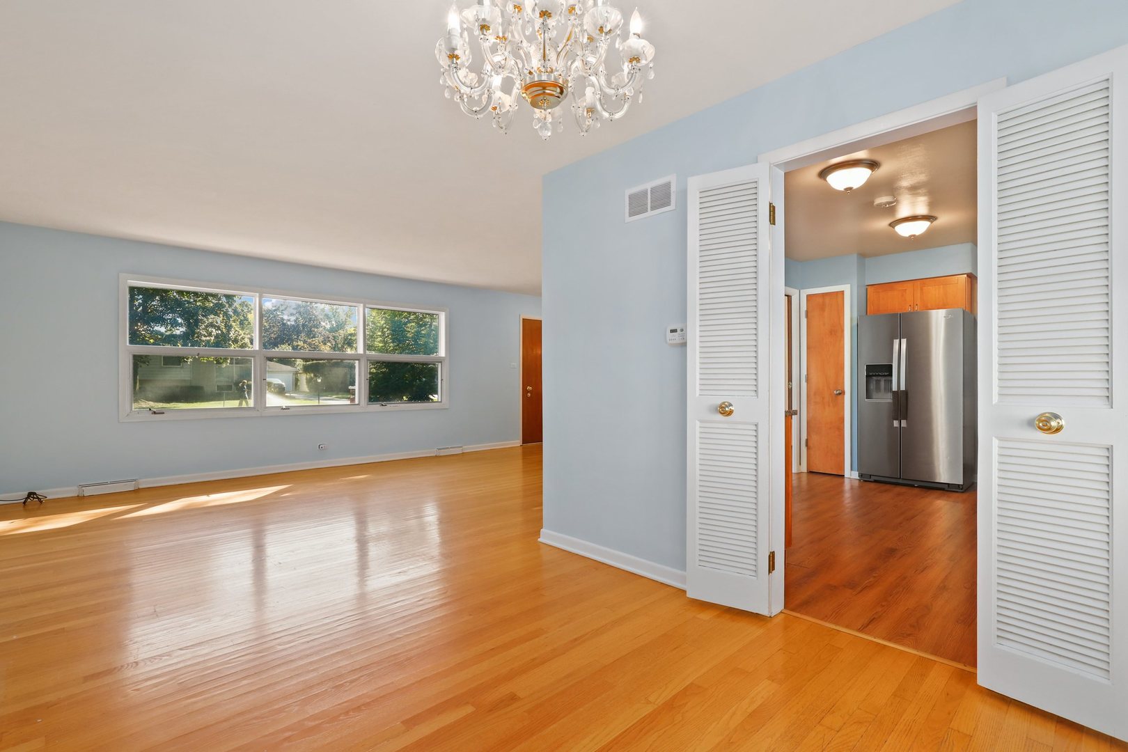 410 Ferndale Road Glenview, IL 60025 - Photo 7 of 34 wooden floor in an empty room with a window