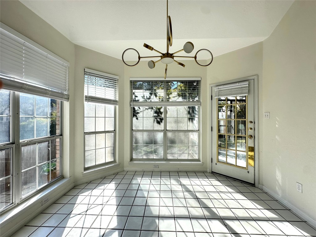 10305 Open Gate Drive Austin, TX 78726 - Photo 14 of 25 a view of an entryway with wooden floor