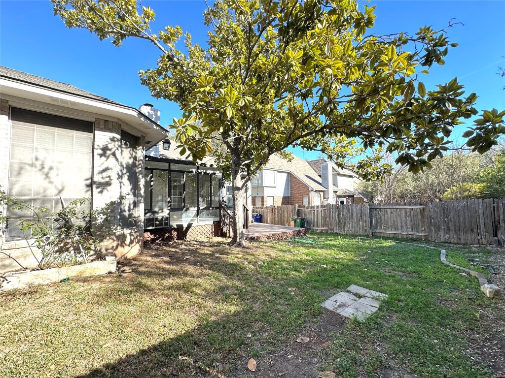 10305 Open Gate Drive Austin, TX 78726 - Photo 25 of 25 a backyard of a house with table and chairs