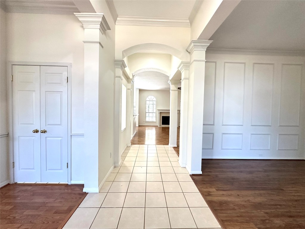 10305 Open Gate Drive Austin, TX 78726 - Photo 4 of 25 a view of a hallway view with wooden floor and staircase