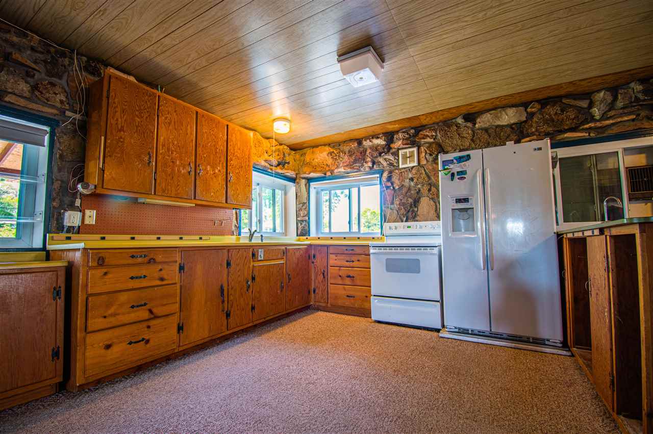1862 J Road Fruita, CO 81521 - Photo 3 of 22 a kitchen with cabinets and stainless steel appliances