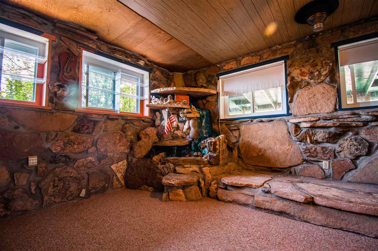 1862 J Road Fruita, CO 81521 - Photo 4 of 22 a room with lots of furniture and a window