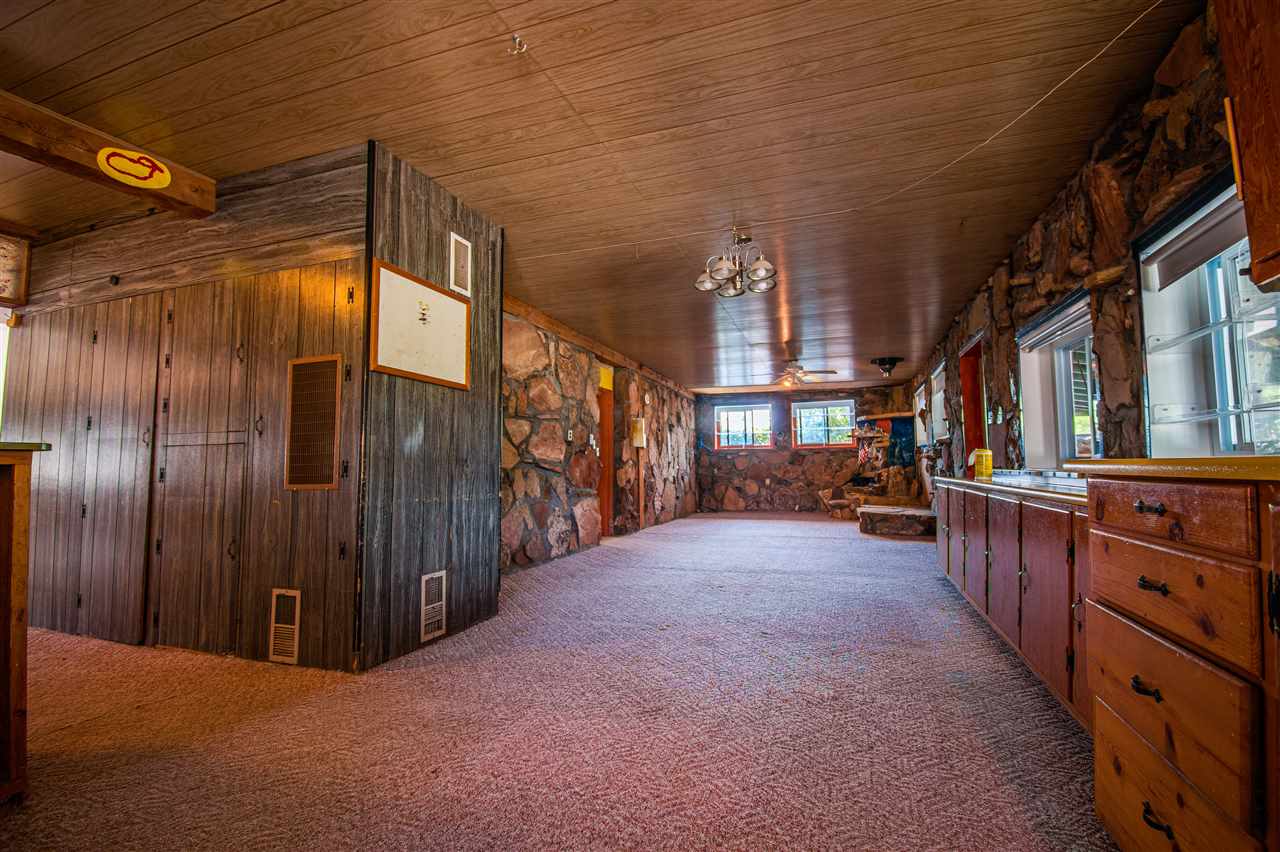 1862 J Road Fruita, CO 81521 - Photo 5 of 22 a view of a porch with furniture and a garage