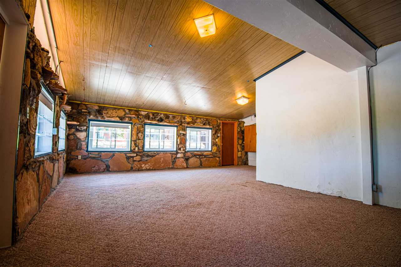 1862 J Road Fruita, CO 81521 - Photo 6 of 22 a view of a livingroom with furniture and a window