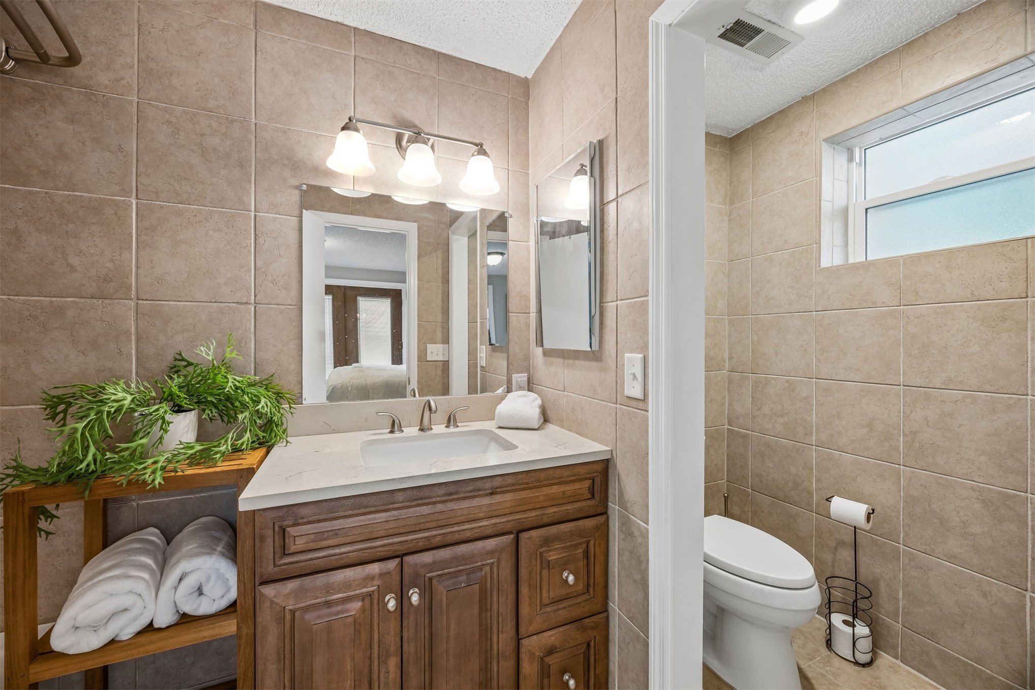 Lot 1 Russell Road Fernandina Beach, FL 32034 - Photo 32 of 43 The primary ensuite bath is privately tucked away and finished in warm, neutral tones.